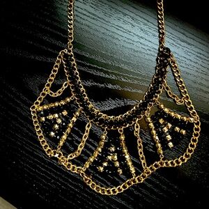 Gold and Black Geometric Necklace with Art Deco Design